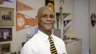 Sylvester Little begins work as Polk State Lakeland's dean of student services on July 1. He is pictured here in his Winter Haven office, which is covered in pennants from schools from which Polk State alumni have graduated. Little, who is known at the College for his passion for student success, tells Polk State students that if they want to add a pennant to his wall, they have to complete their degree at that institution. It's just one of the ways he helps students visualize -- and ultimately achieve -- their goals.