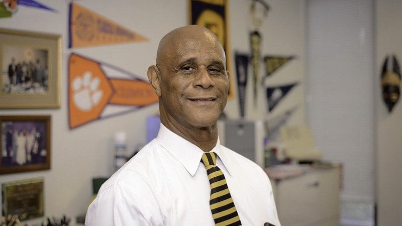 Sylvester Little begins work as Polk State Lakeland's dean of student services on July 1. He is pictured here in his Winter Haven office, which is covered in pennants from schools from which Polk State alumni have graduated. Little, who is known at the College for his passion for student success, tells Polk State students that if they want to add a pennant to his wall, they have to complete their degree at that institution. It's just one of the ways he helps students visualize -- and ultimately achieve -- their goals.