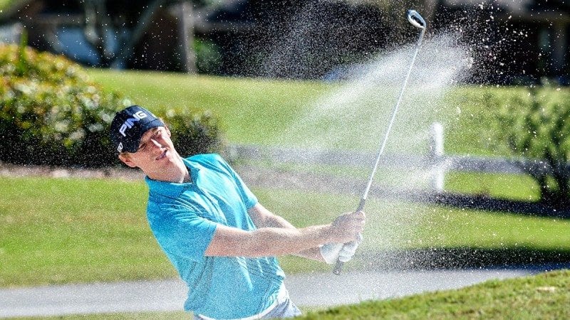 A golfer hits out of a sand trap during Polk State College Foundation’s 23rd annual William N. Ryan Memorial Golf Classic, presented by A.D. Morgan Corp. in partnership with MidAmerica Administrative and Retirement Solutions, Inc.