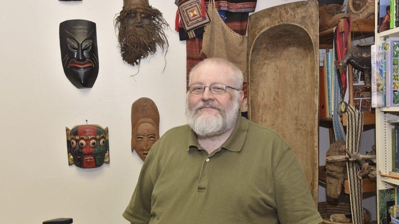 Professor Logan Randolph, whose office at Polk State Winter Haven, WSC 132, is filled with items he's collected during his many trips abroad, teaches in the College's Global Studies Program.