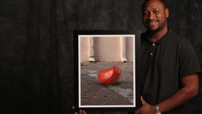 Jamie Lisbon with the photograph that won First Place at the 2015 Strawberry Festival Photography Contest.