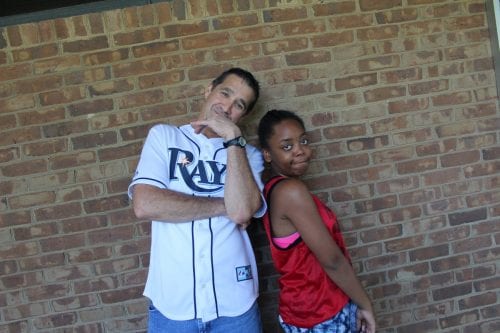 Collegiate teacher Mr. Childree and Senior Ashley Rodgers pose for Jersey Day.