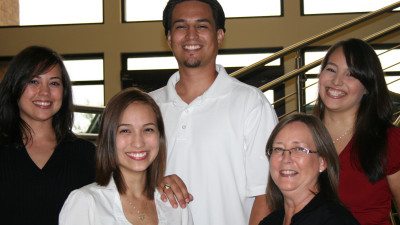 Back row from left, Cheryl Tanner, Eric Huron, Desiree Huron. Front row from left, Angela Huron and Treasure Huron. Treasure and each of her four children studied at Polk State College.