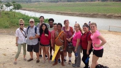 Polk State Nursing and Healthcare Administration students prepare to board canoes that will transport them to Panama's indigenous Embera tribe.