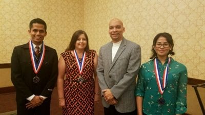 Four Polk State College students were honored at Thursday's Florida College System All-Florida Academic Team Awards. From left, Nazmul Nayeem, Angela Duffield, Vice President for Student Services Reggie Webb, and Jaysha Camacho. Not pictured is Victoria Goucher.