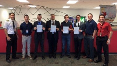 From left, ExpressJet First Officer Dano Pebler, Captain Joey Cook, Polk State Aerospace students Aaron Poidevin, Eric Martin, John Reichert, Nathan Calhoun, ExpressJet First Officer Peter Ryan, and First Officer Jack Eastes. A total of seven Polk State Aerospace students were extended conditional job offers during ExpressJet's first hiring visit to the College last week.