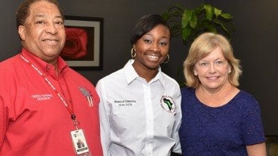 From left, Polk State Psychology Professor Greg Harris, Kailah Ruffen, and Polk State President Eileen Holden.