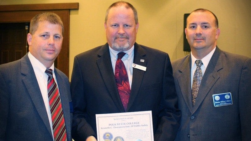 The Polk State Kenneth C. Thompson Institute of Public Safety has again received a perfect audit from the Florida Department of Law Enforcement's Criminal Justice Standards and Training Commission. From left, FDLE Bureau Chief Glen Hopkins, Polk State Vice President of of Administration and Chief Financial Officer Peter Elliott, and Polk County Sheriff's Office Capt. Bill Mann, who also serves as director of the Institute.