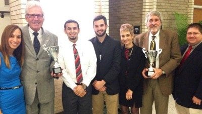 Celebrating the Polk State Corporate College's wins at the 5th Annual Champions Cup Business & Industry Awards last week in Bartow were, from left: Professional Development Institute Program Coordinator Nyrka Riskin; Polk State Corporate College Director Rob Clancey; Polk State Corporate College Event Coordinator Samuel Serrano; Advanced Manufacturing Institute Interim Director Wyatt Dube; IT Institute Program Coordinator Mary Ellen Schmitt; Polk State Lakeland Provost Stephen Hull; and Advanced Manufacturing Institute Program Coordinator Sam Hale.