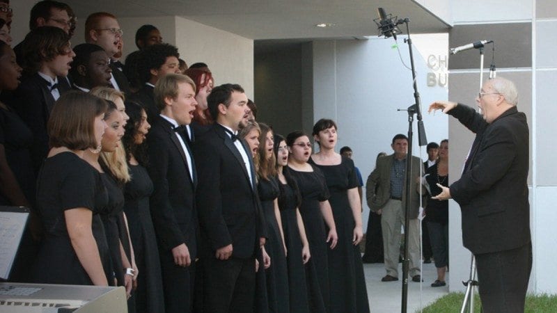 Polk State Music Professor John Anderson leads his students during a special performance at the Winter Haven campus. Each year, the program puts on about 50 concerts throughout the county. The program is known for high expectations and preparing students not only to perform but to move on to prestigious four-year programs.