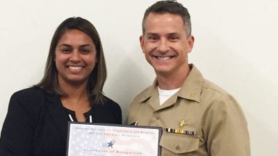 Professor Suzanne Halverson with Capt. Robert Tosatto, director of the Medical Reserve Corps.