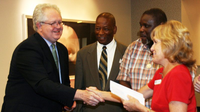 From left, Division of Florida Colleges Chancellor Randall Hanna, Polk State scholarship recipients Casmore Shaw and Odell Harvey Jr., and Polk State President Eileen Holden. Hanna visited Polk State Winter Haven on Wednesday as part of a statewide Florida College System Foundation scholarship tour. Shaw and Harvey were among seven Polk students to receive scholarships.