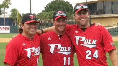 Coaches Cook, Corbeil and Martin (L-R), moments after securing Polk's first World Series berth.