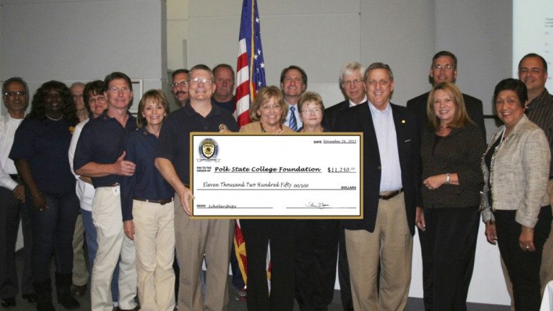 The Lakeland Citizens' Police Academy Alumni Association has donated $11,250 to the Polk State College Foundation. Attendees of the November check presentation at the Polk State District Board of Trustees meeting were, back row from left, Anu Saxena, development chair of the Polk State College Foundation Board of Directors; Dick Fearnow; Michael Matlick; Bill Uhrie; Polk State District Board of Trustees Chair Mark Turner; Polk State District Board of Trustees members Dan Dorrell, Gregory Littleton, Ricardo Garcia. Middle row from left, Veronica Rountree, Karen Scites. Front row from left, Gary Brown, Mickie Brown, Steve Jones, Polk State President Eileen Holden, Shirley Mobley, Polk State District Board of Trustees members E.S. "Ernie" Pinner, Teresa Martinez; Polk State District Board of Trustees Vice Chair Linda Pilkington.