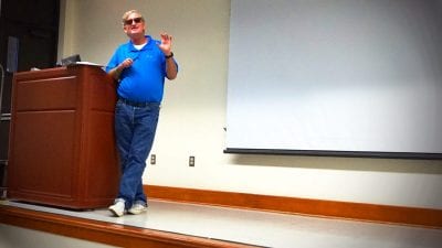 Florida Southern College Associate Professor of Political Science R. Bruce Anderson speaks to Polk State Lakeland Collegiate High School students on Tuesday.