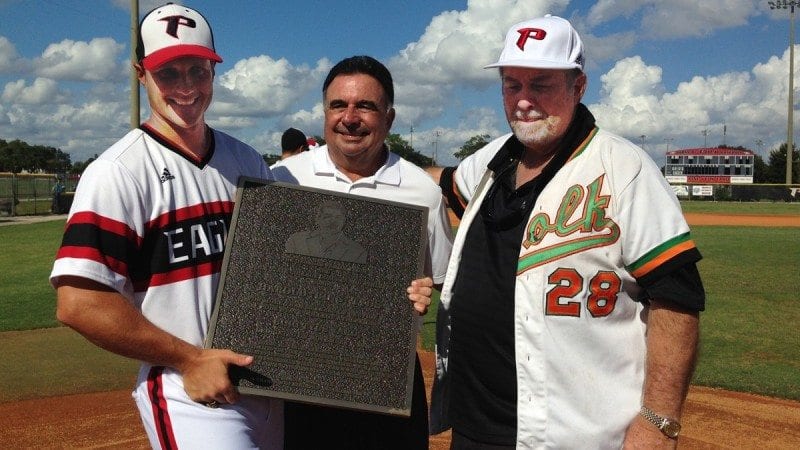 Polk State honored Bing Tyus, former baseball coach and current athletic director, on Saturday during a ceremony to dedicate Bing Tyus Yard. From left, Polk State Baseball Coach Al Corbeil, Polk State Athletics benefactor Bob Georges, and Bing Tyus.